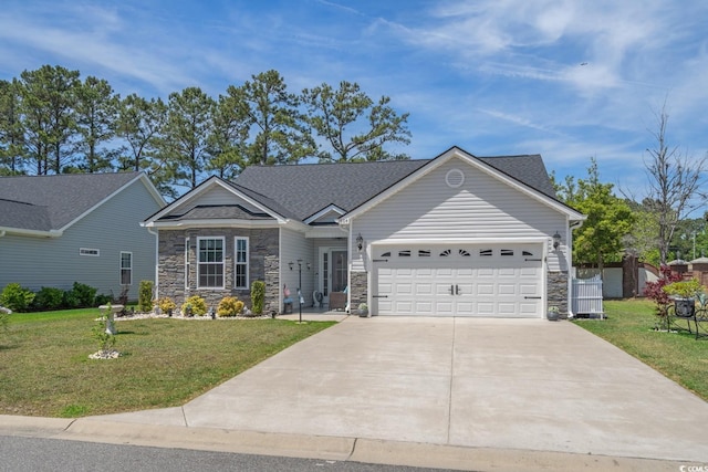 804 Twickenham Loop, Longs, SC 29568 - view of front of house featuring concrete driveway, an attached garage, a front yard, and stone siding