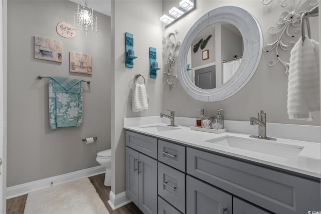 804 Twickenham Loop, Longs, SC 29568 - full bath featuring a sink, double vanity, toilet, and wood finished floors
