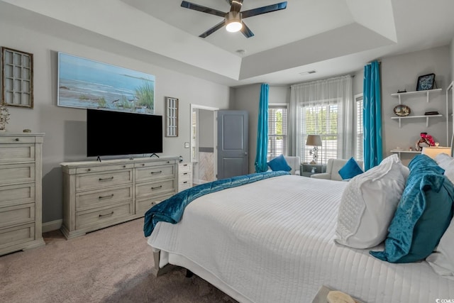804 Twickenham Loop, Longs, SC 29568 - bedroom featuring baseboards, visible vents, ceiling fan, a raised ceiling, and light colored carpet
