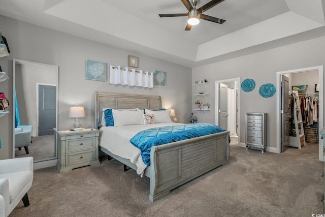 804 Twickenham Loop, Longs, SC 29568 - bedroom featuring carpet, connected bathroom, baseboards, a raised ceiling, and a spacious closet
