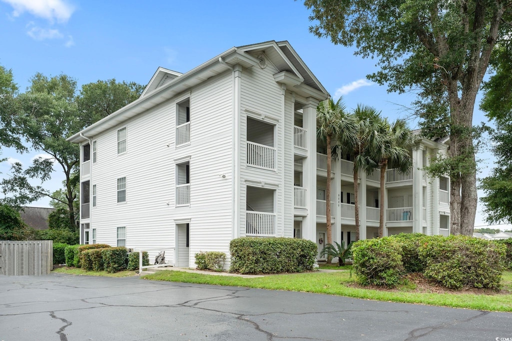 9550 Dunes Gable Dr Unit A, Myrtle Beach, SC 29572 - view of building exterior with fence