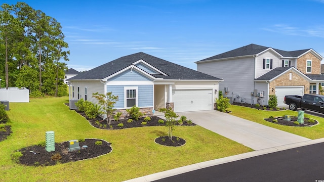 4609 Day Lily Run St, Myrtle Beach, SC 29579 - craftsman-style house featuring concrete driveway, a garage, central air condition unit, and stone siding