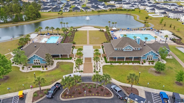 4609 Day Lily Run St, Myrtle Beach, SC 29579 - aerial perspective of suburban area with a pool and a nearby body of water
