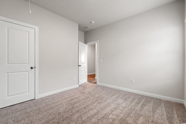 4609 Day Lily Run St, Myrtle Beach, SC 29579 - unfurnished bedroom with carpet floors, baseboards, and attic access