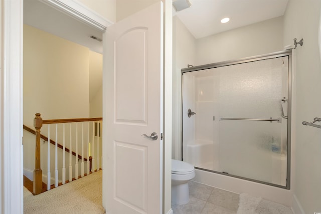220 Waterfall Cir, Little River, SC 29566 - bathroom with a shower stall, tile patterned flooring, visible vents, and toilet