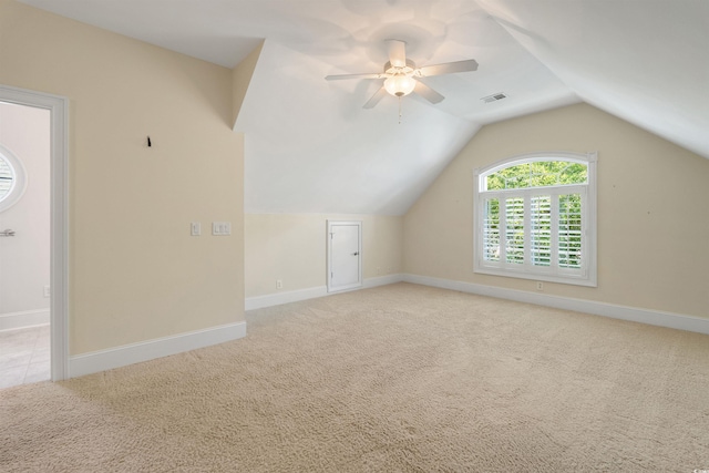 220 Waterfall Cir, Little River, SC 29566 - additional living space with a ceiling fan, visible vents, baseboards, light colored carpet, and lofted ceiling