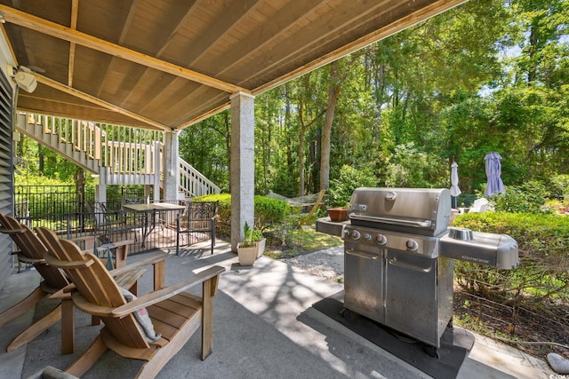 view of patio featuring stairway and grilling area