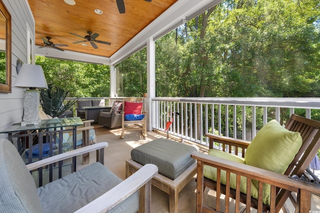 exterior space featuring ceiling fan