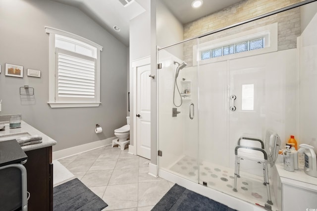 bathroom with toilet, vanity, recessed lighting, a shower stall, and baseboards