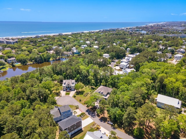 birds eye view of property with a water view and a residential view