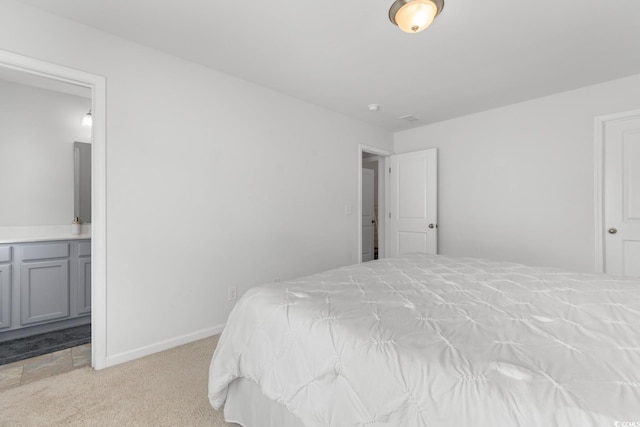 1123 Fairway Ln Unit 1123, Conway, SC 29526 - bedroom featuring light colored carpet, ensuite bathroom, and baseboards