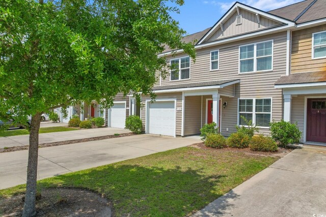 1123 Fairway Ln Unit 1123, Conway, SC 29526 - townhome / multi-family property with driveway, a shingled roof, a garage, and board and batten siding