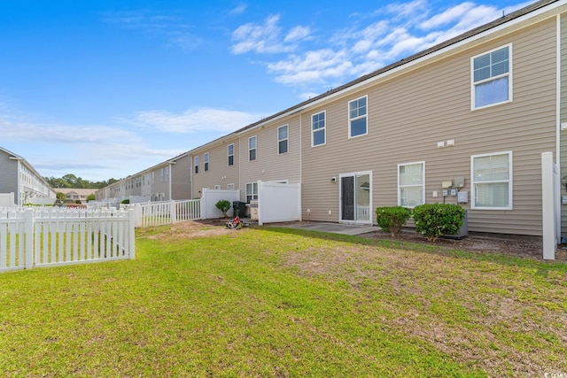 1123 Fairway Ln Unit 1123, Conway, SC 29526 - back of property featuring a fenced backyard and a yard