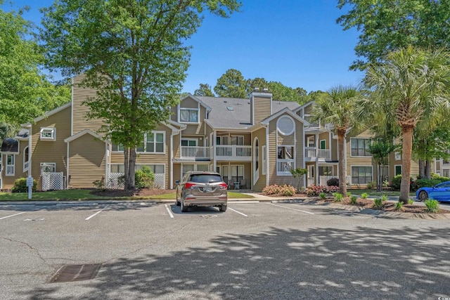900 Courtyard Dr Unit K7, Myrtle Beach, SC 29577 - view of building exterior featuring uncovered parking