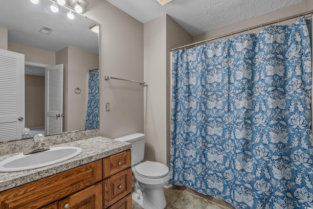 900 Courtyard Dr Unit K7, Myrtle Beach, SC 29577 - full bathroom featuring toilet, vanity, a textured ceiling, visible vents, and tile patterned flooring