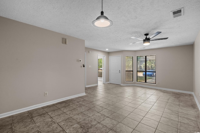 900 Courtyard Dr Unit K7, Myrtle Beach, SC 29577 - unfurnished room featuring a ceiling fan, tile patterned floors, a textured ceiling, visible vents, and baseboards
