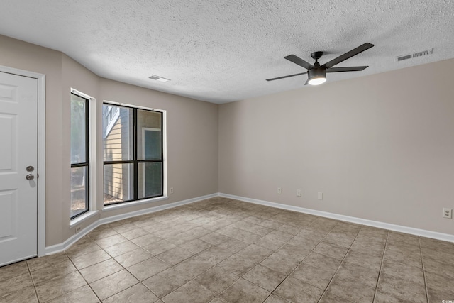 900 Courtyard Dr Unit K7, Myrtle Beach, SC 29577 - spare room featuring ceiling fan, a textured ceiling, visible vents, and tile patterned flooring