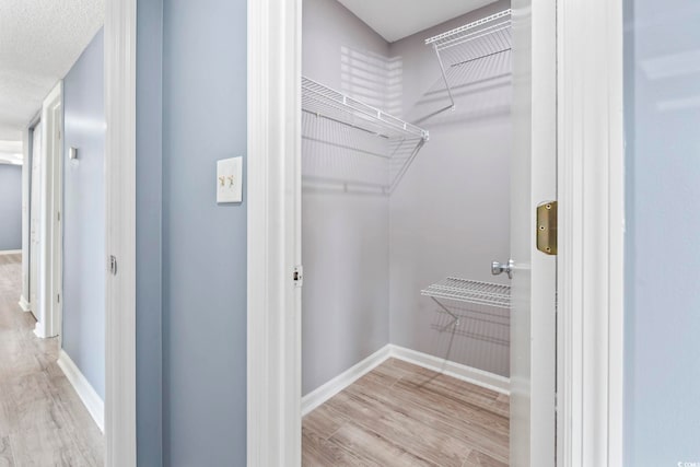 2258 Essex Dr Unit G, Surfside Beach, SC 29575 - spacious closet with wood finished floors