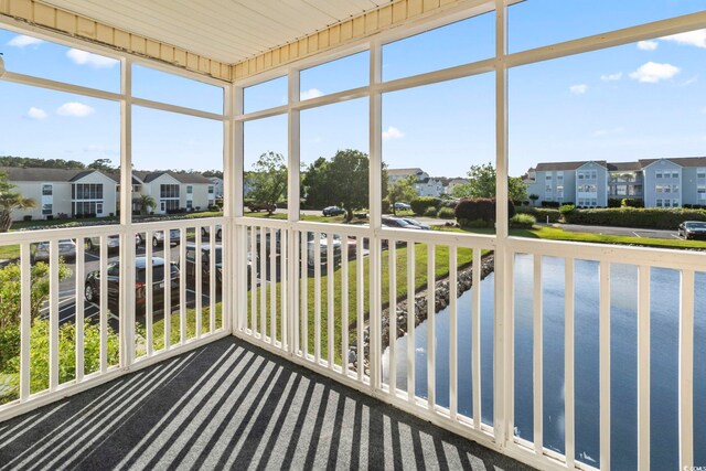 2258 Essex Dr Unit G, Surfside Beach, SC 29575 - unfurnished sunroom with a residential view