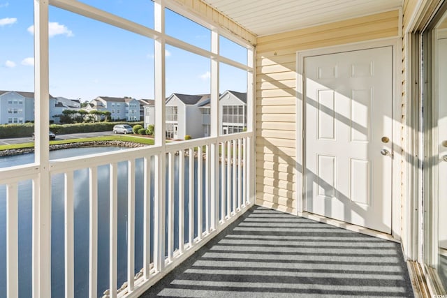 2258 Essex Dr Unit G, Surfside Beach, SC 29575 - unfurnished sunroom featuring a residential view