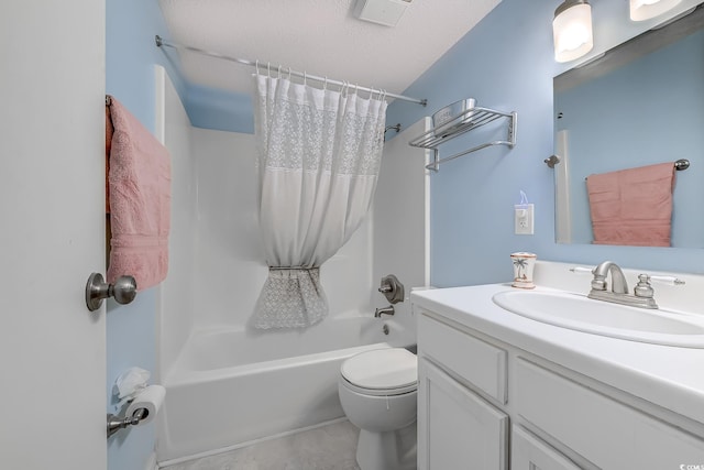 full bath with shower / bathtub combination with curtain, vanity, toilet, tile patterned flooring, and a textured ceiling