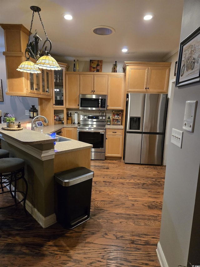 1717 Perdiz Covey Ct, Myrtle Beach, SC 29588 - kitchen with appliances with stainless steel finishes, a sink, a peninsula, glass insert cabinets, and light brown cabinetry