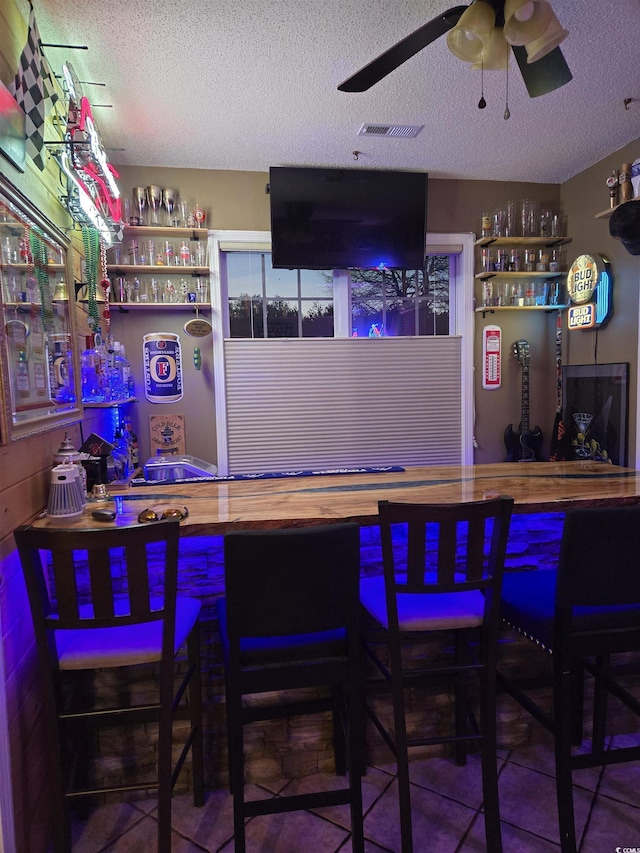 1717 Perdiz Covey Ct, Myrtle Beach, SC 29588 - indoor dry bar with a textured ceiling and ceiling fan