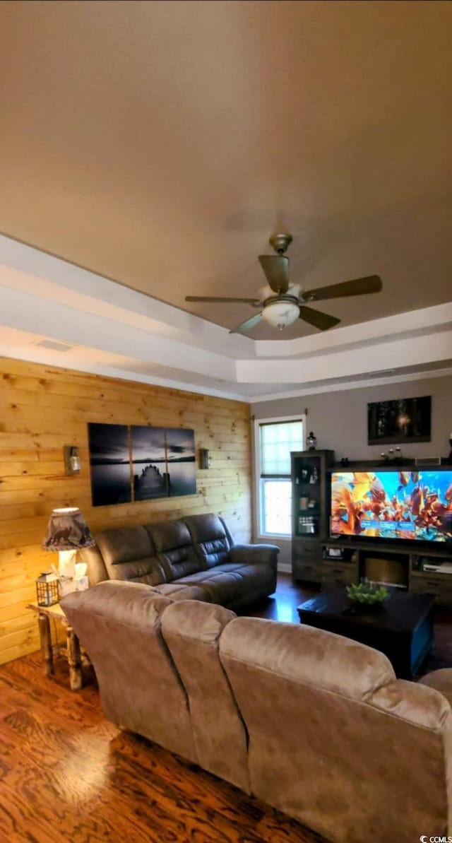 1717 Perdiz Covey Ct, Myrtle Beach, SC 29588 - living area with a raised ceiling, wood finished floors, a ceiling fan, and wooden walls