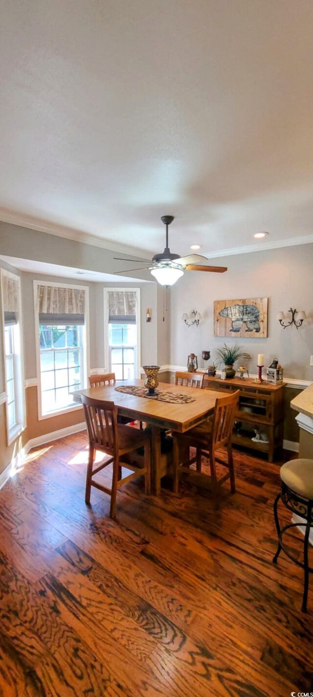 1717 Perdiz Covey Ct, Myrtle Beach, SC 29588 - dining room with wood finished floors, a ceiling fan, and ornamental molding