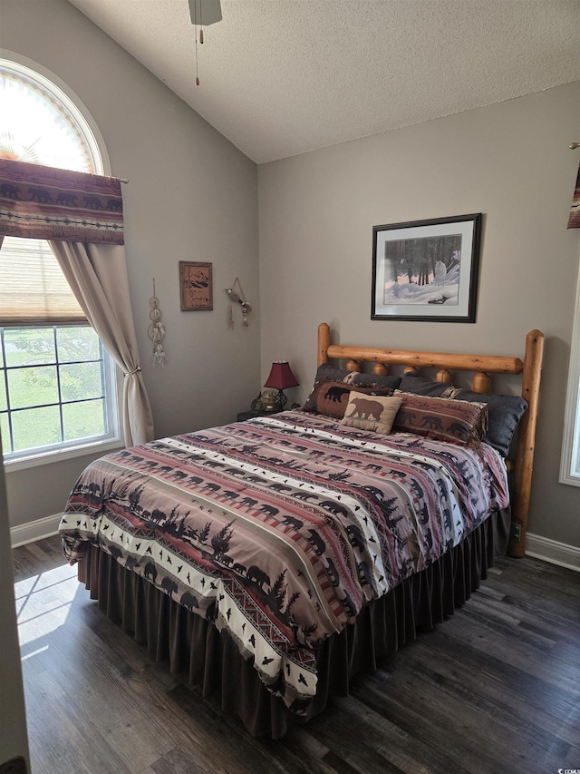 1717 Perdiz Covey Ct, Myrtle Beach, SC 29588 - bedroom with wood finished floors, baseboards, a textured ceiling, and lofted ceiling