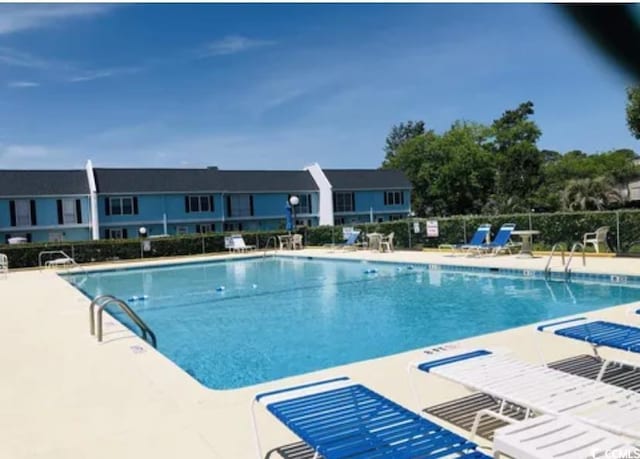 913 Villa Dr Unit 913, North Myrtle Beach, SC 29582 - pool featuring a patio area and fence