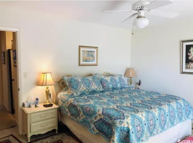913 Villa Dr Unit 913, North Myrtle Beach, SC 29582 - bedroom with a ceiling fan