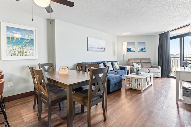 205 74th Ave N Unit 1104, Myrtle Beach, SC 29572 - dining space with wood finished floors, a textured ceiling, a ceiling fan, and baseboards
