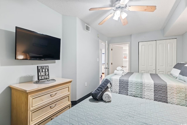 205 74th Ave N Unit 1104, Myrtle Beach, SC 29572 - bedroom with ceiling fan, a closet, and baseboards