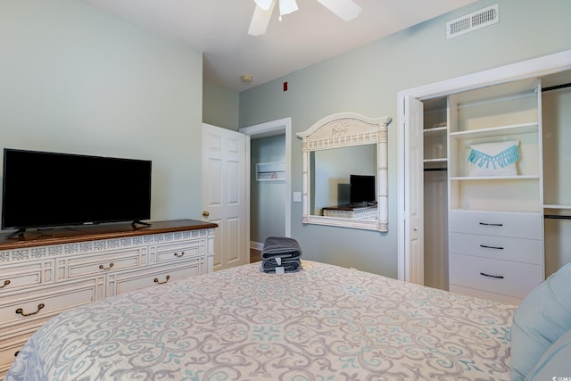 bedroom with ceiling fan and visible vents