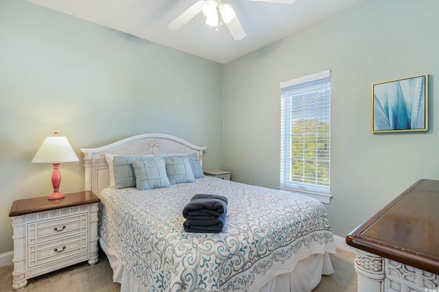 bedroom featuring carpet flooring, baseboards, and ceiling fan