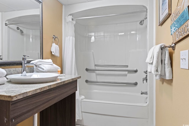 full bathroom featuring shower / tub combo and vanity