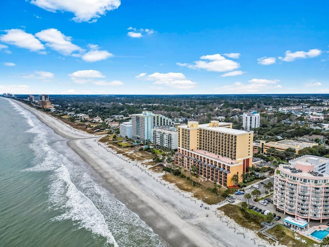 aerial view of waterfront with a beach