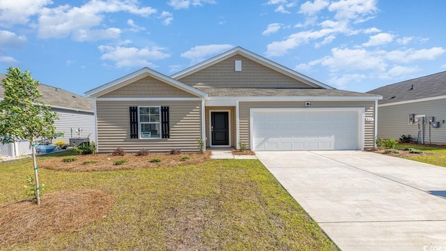 1406 Nokota Dr, Conway, SC 29526 - view of front of house featuring a front yard, an attached garage, and driveway