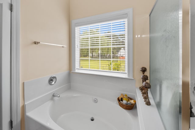 full bath featuring a bath