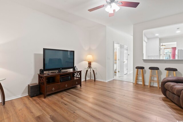 157 Olde Towne Way Unit 4, Myrtle Beach, SC 29588 - living room with baseboards, wood finished floors, and a ceiling fan