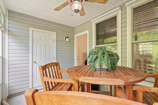 157 Olde Towne Way Unit 4, Myrtle Beach, SC 29588 - sunroom featuring outdoor dining area and ceiling fan