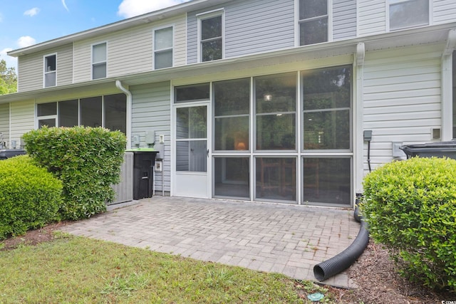 157 Olde Towne Way Unit 4, Myrtle Beach, SC 29588 - back of property featuring a patio and a sunroom