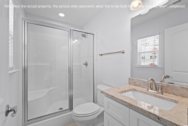 bathroom with a shower stall, recessed lighting, vanity, and toilet