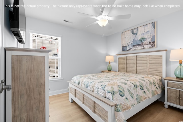 bedroom with light wood-type flooring, baseboards, visible vents, and a ceiling fan