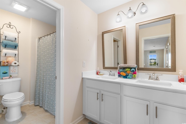 full bath with double vanity, toilet, tile patterned flooring, and a sink