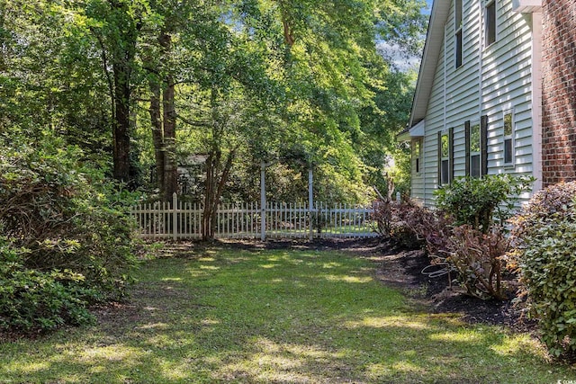 view of yard with fence