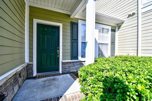 6172 Catalina Dr Unit 214, North Myrtle Beach, SC 29582 - doorway to property with a porch and stone siding