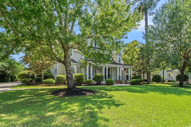 93 Knotty Pine Way, Murrells Inlet, SC 29576 - view of front of home with covered porch and a front yard