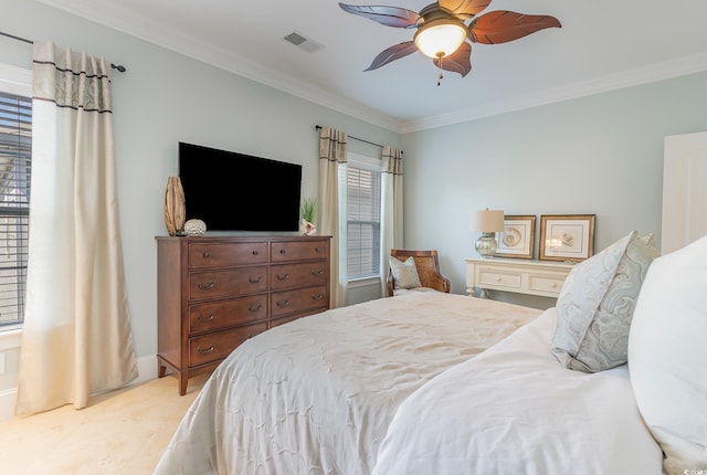 bedroom featuring ornamental molding and a ceiling fan